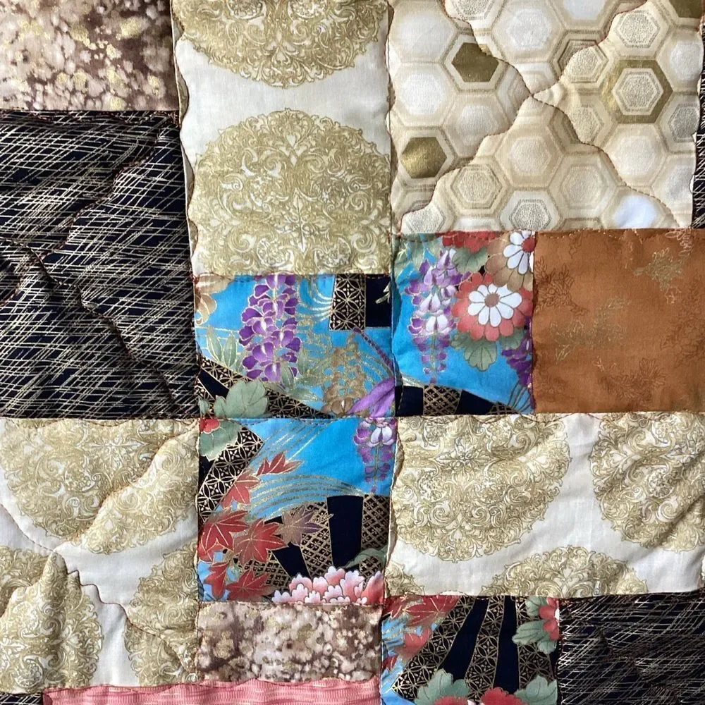 NWT. Hand Crafted Gold Toned Prints with Oriental Influence Quilt